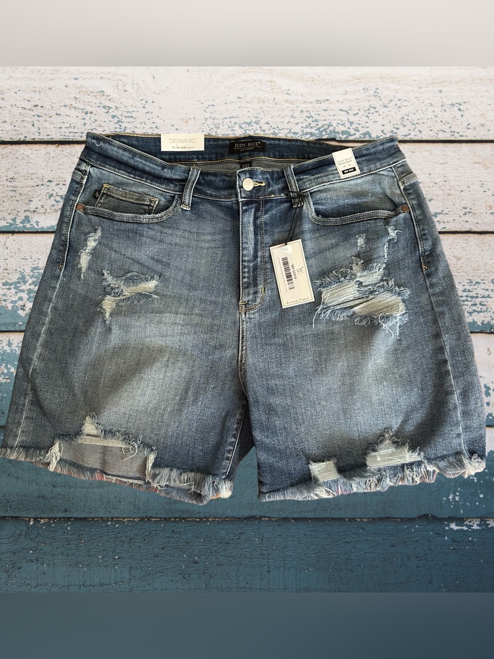 NWT! JUDY BLUE + SIZE SHORTS,MID RISE, DISTRESSED FRINGE HEM, SIZE 3X. MED BLUE.